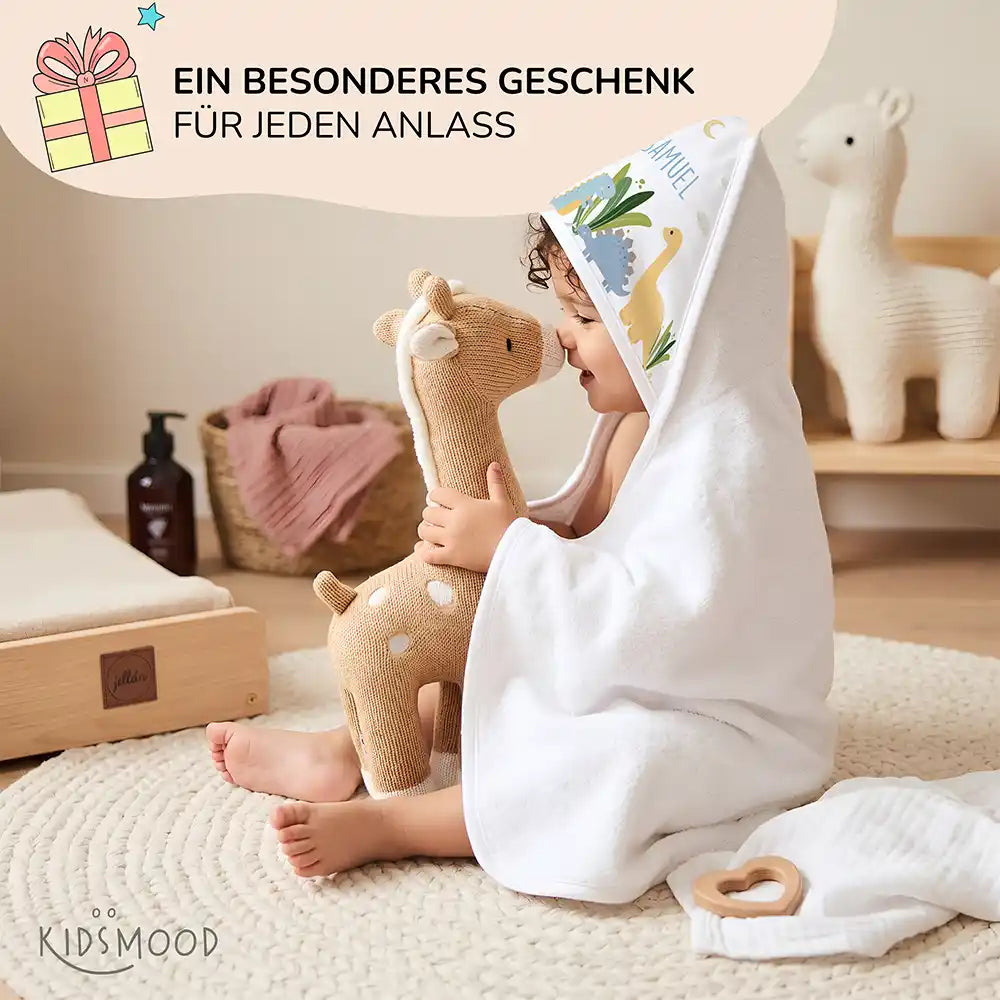 Personalisiertes Kapuzenhandtuch Baby Dinosaurier Mond â Babygeschenk-Szene mit Strickspielzeug