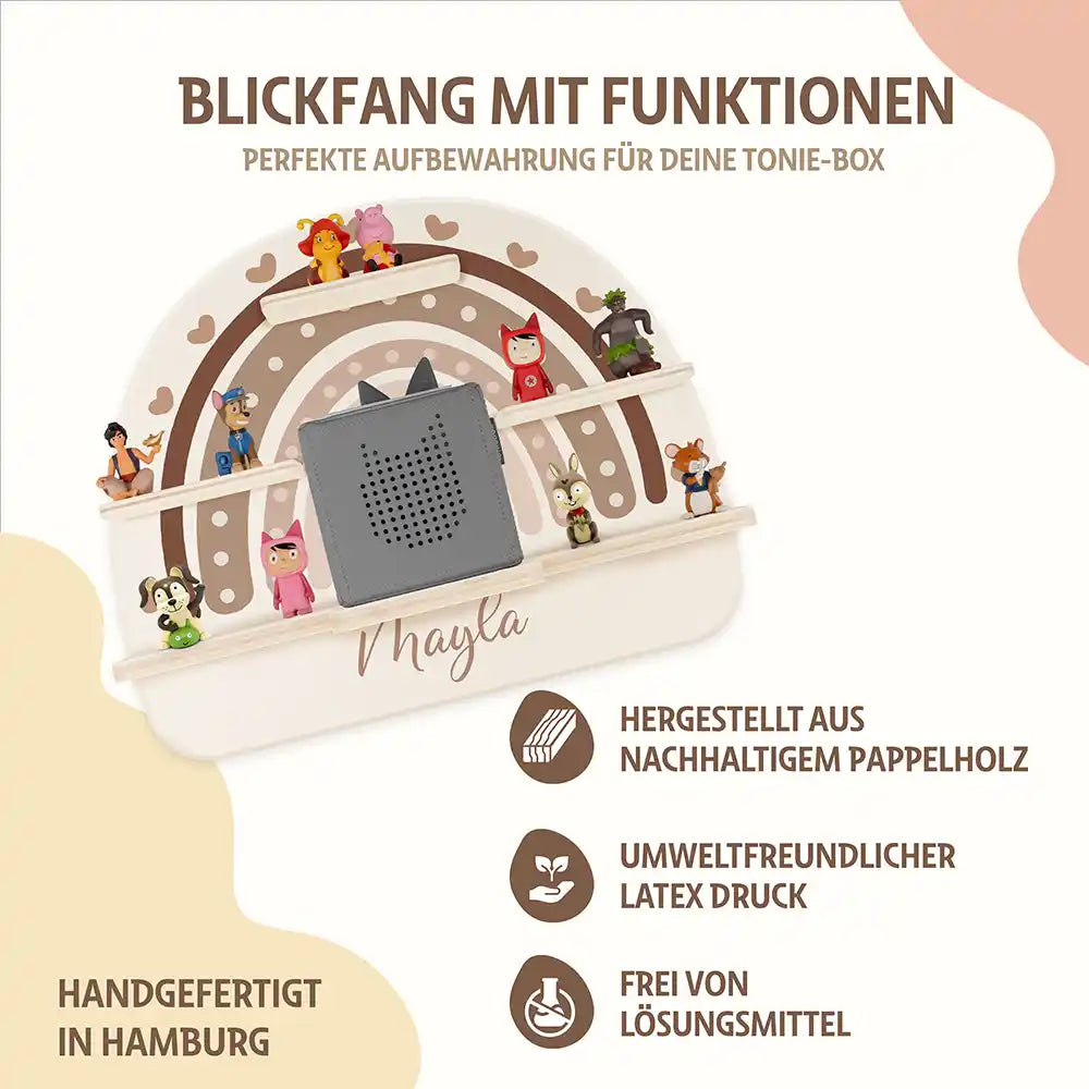 detailansicht der gravierten regenbogen und herz motive auf dem tonieregal