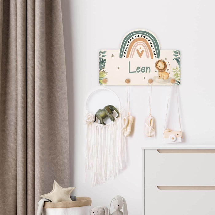 handcrafted wooden coat rack with rainbow and lion design