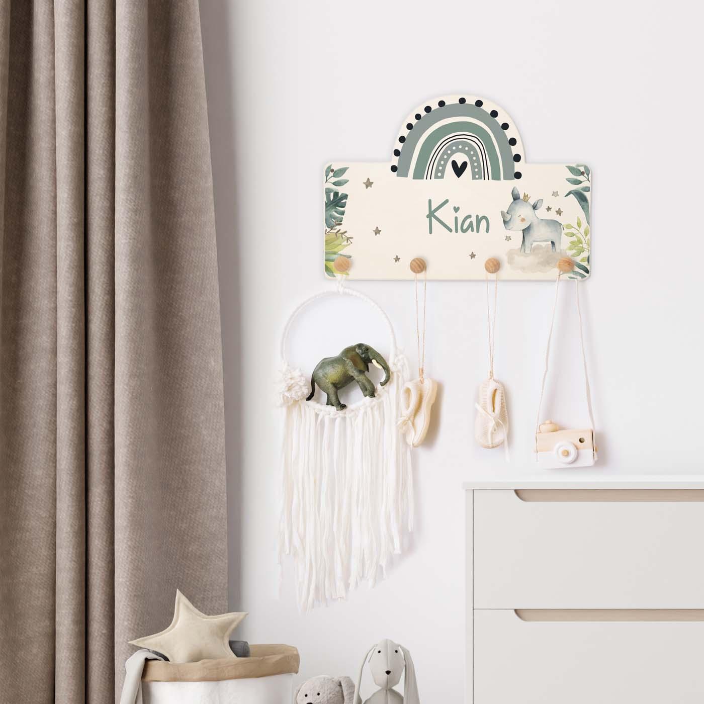 handcrafted wooden coat rack with rainbow and rhinoceros design