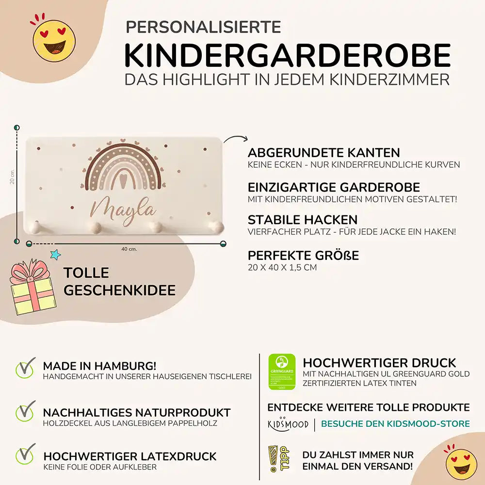 detailansicht der gravierten regenbogen und herz motive auf der holzgarderobe
