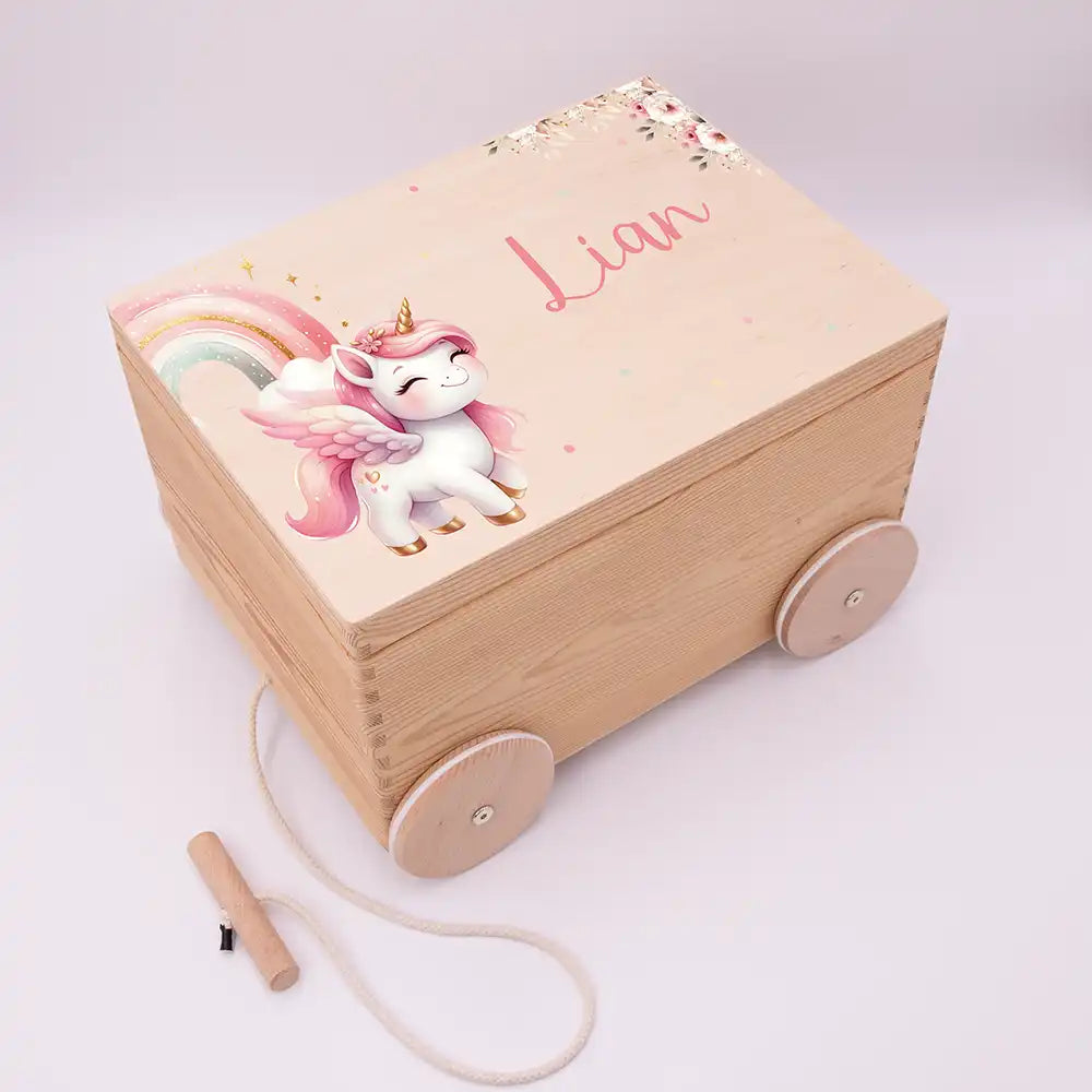 Spielzeugkiste mit Rädern personalisiert - Einhorn
