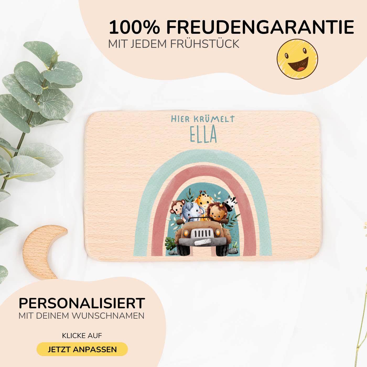 nahaufnahme des frühstücksbrettchens mit regenbogen-safari motiv