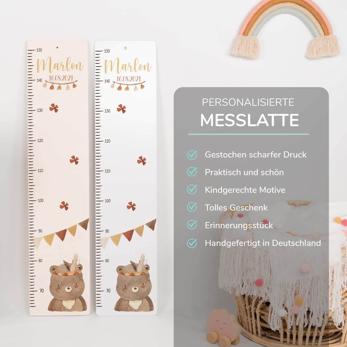 detailansicht der gravur auf der messlatte mit bär boho