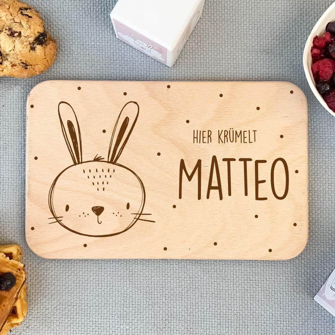 close-up of personalized design on wooden breakfast board