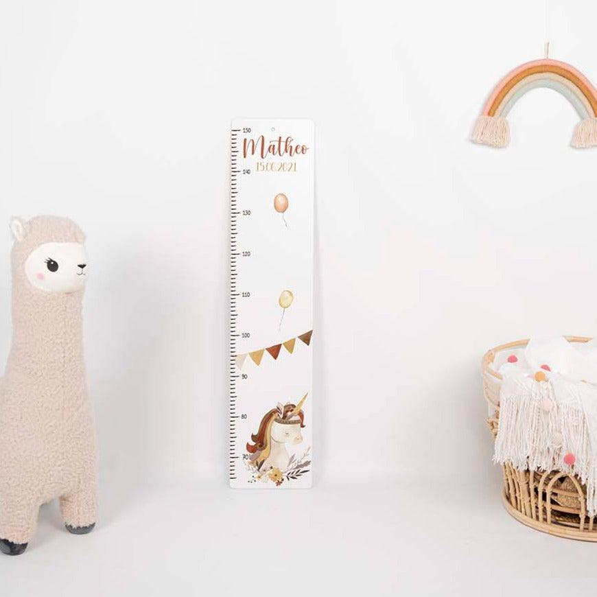 close-up of growth chart with elefant boho motif